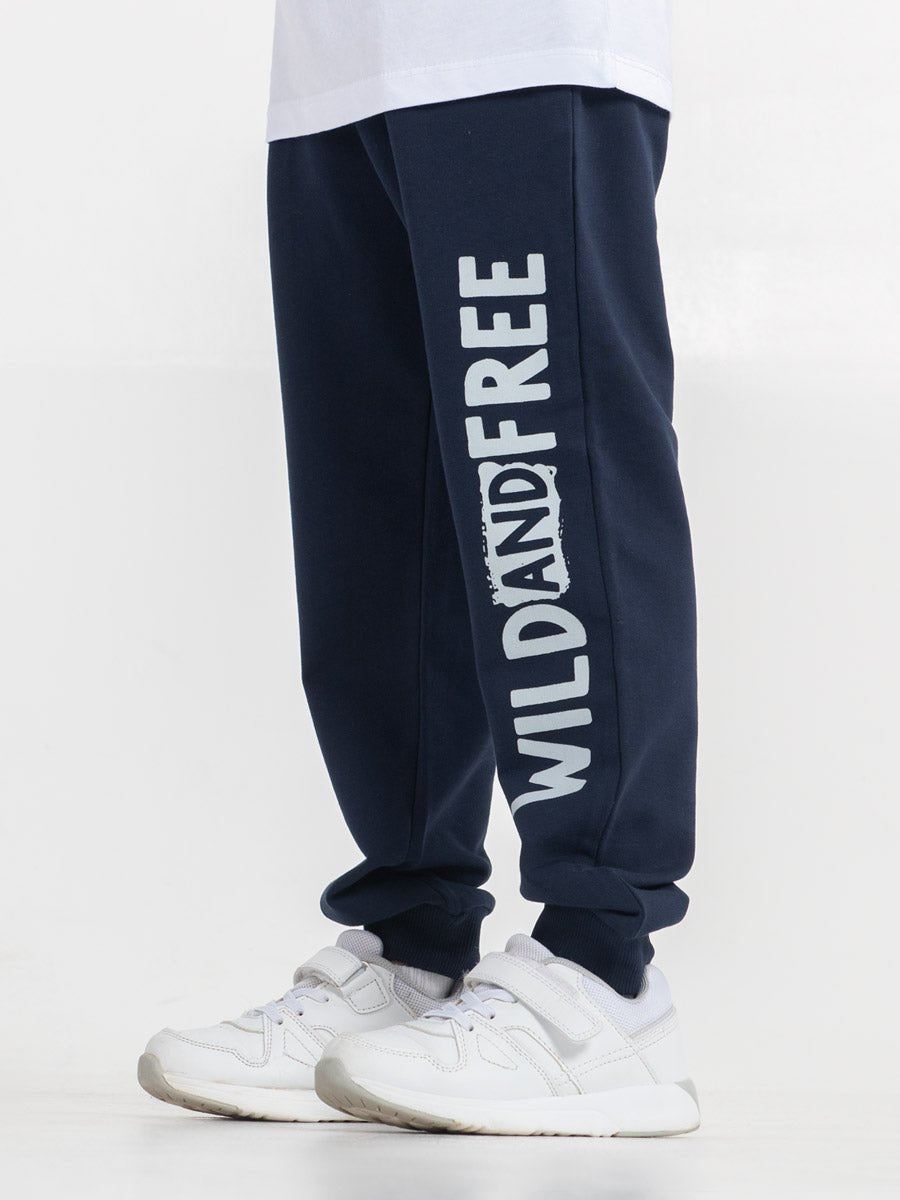 CWKB 70107-41-288 - Cherubino boys dark blue pants with wild and free print - model1