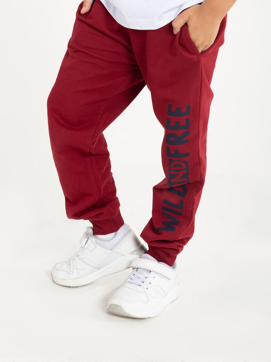 CWKB 70107-32-288 - Cherubino boys red pants with wild and free print - model1