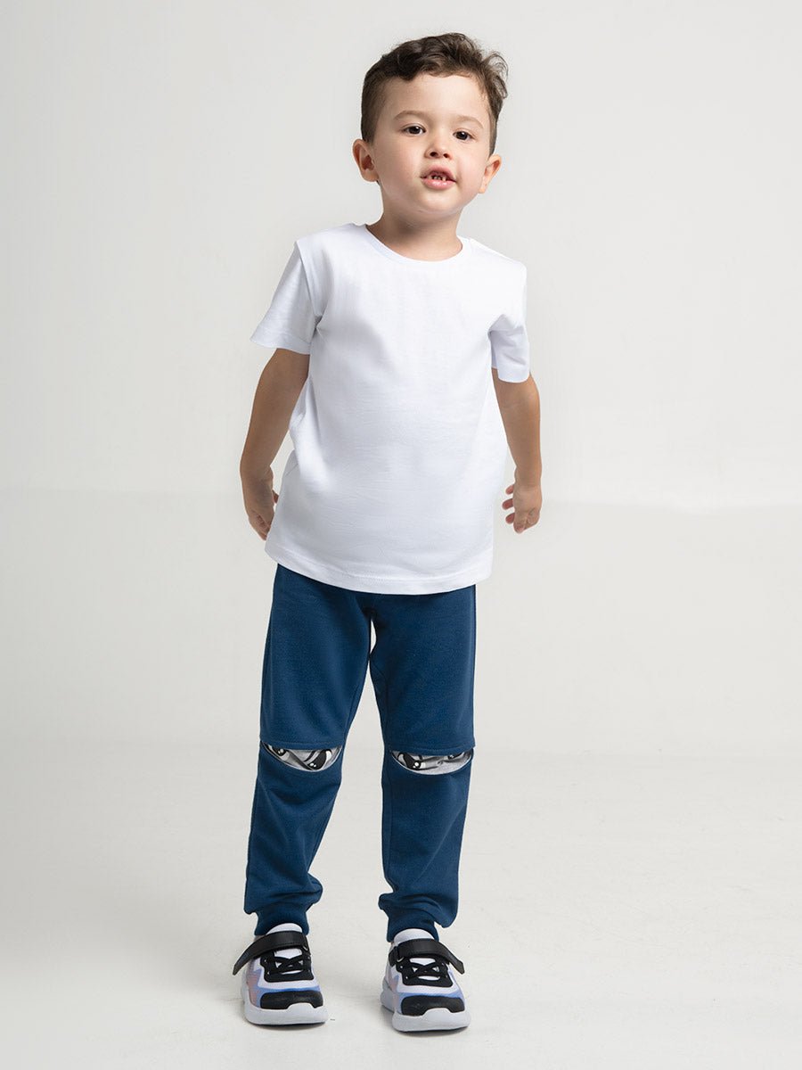 CWKB 70076-39-283 - Cherubino boys dark blue pants with kung fu eyes print - model1